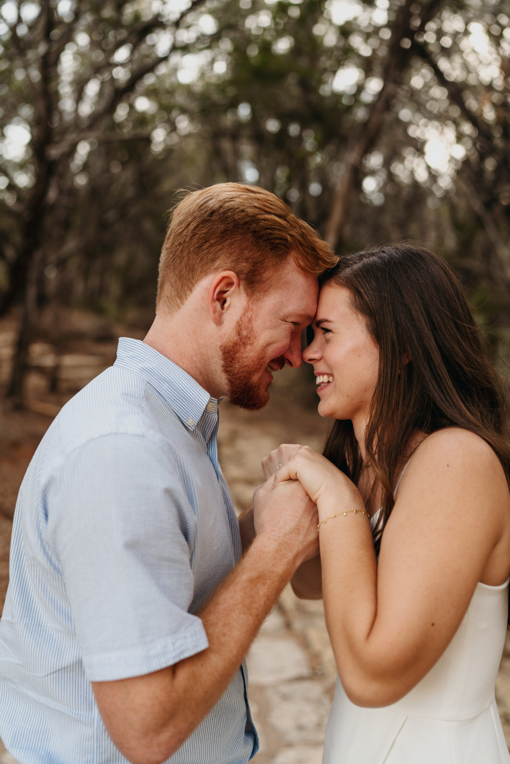 This timeless engagement session took place at the gorgeous Pedernales Falls State Park in Austin, Texas. We hiked the stunning Texas landscape to come across the infamous falls for their adventure engagement session. The couple’s outfit perfectly exuded their personality while also letting the scenery speak for itself. Angelina Loreta Photography created timeless engagement pictures for the Austin couple.