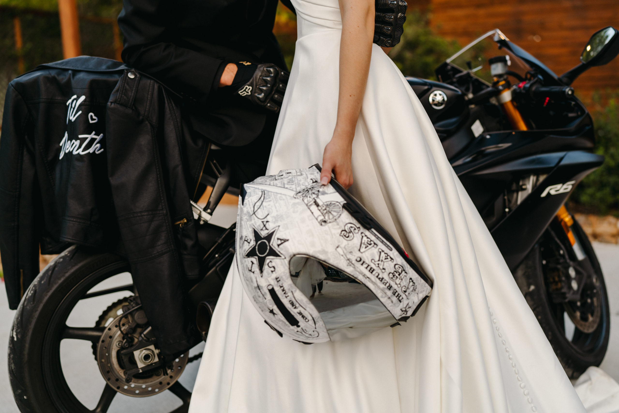 bride holding biker helmet