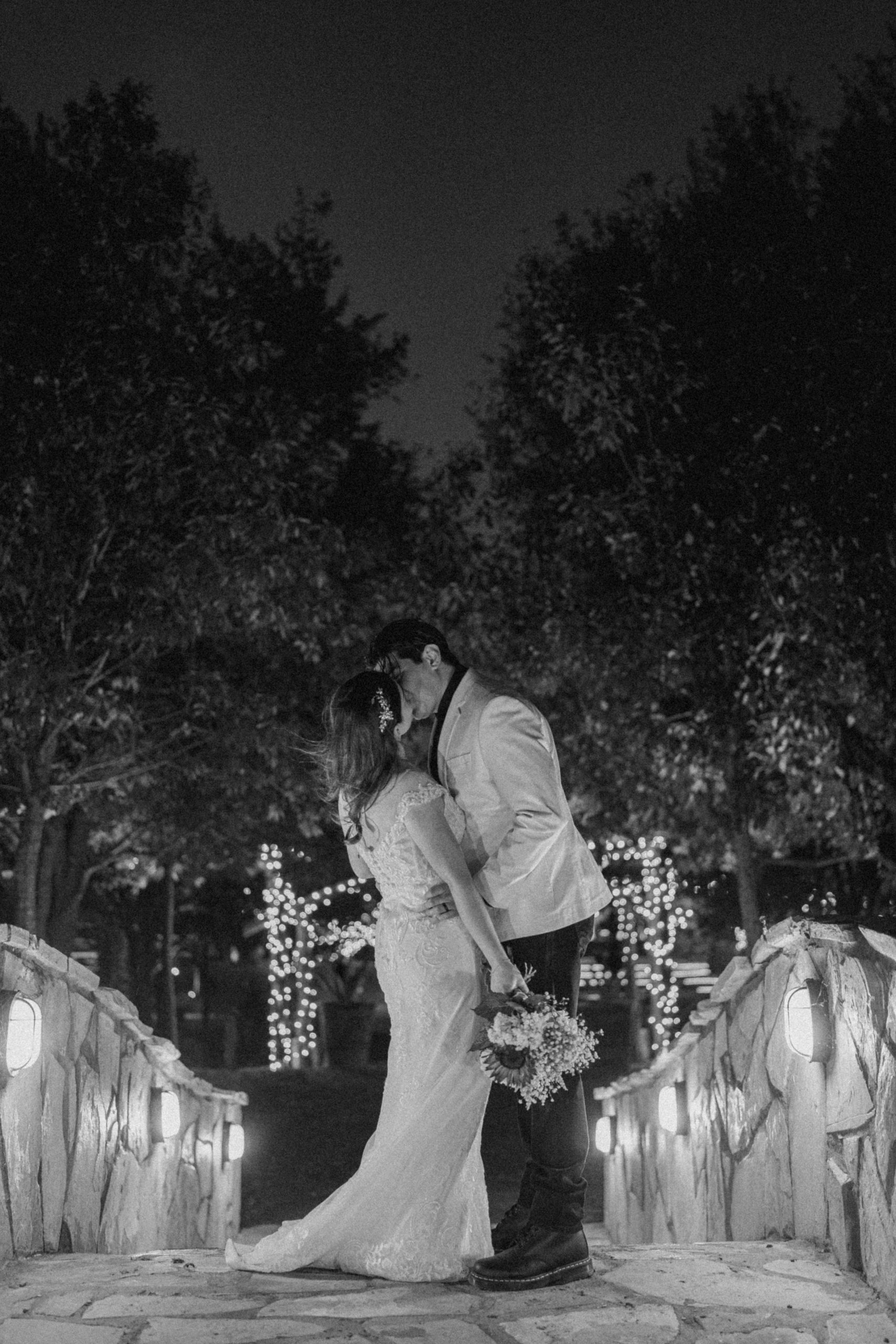 These timeless bride and groom photos were taken after dark. This non-traditional couple were eager to create editorial style flash portraits with Angelina Loreta Photography.
