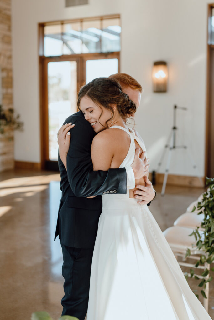 Their ceremony space was one of dreams. Canyonwood Ridge in Dripping Springs, Texas offers a jaw dropping ceremony space perfect for a timeless wedding.