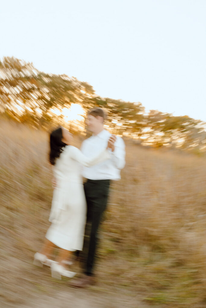 blurry documentary style engagement photos in the fall