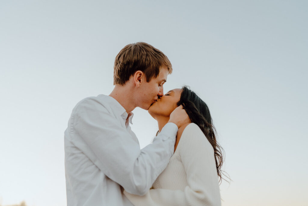 couple kissing fall engagement photos in boerne texas