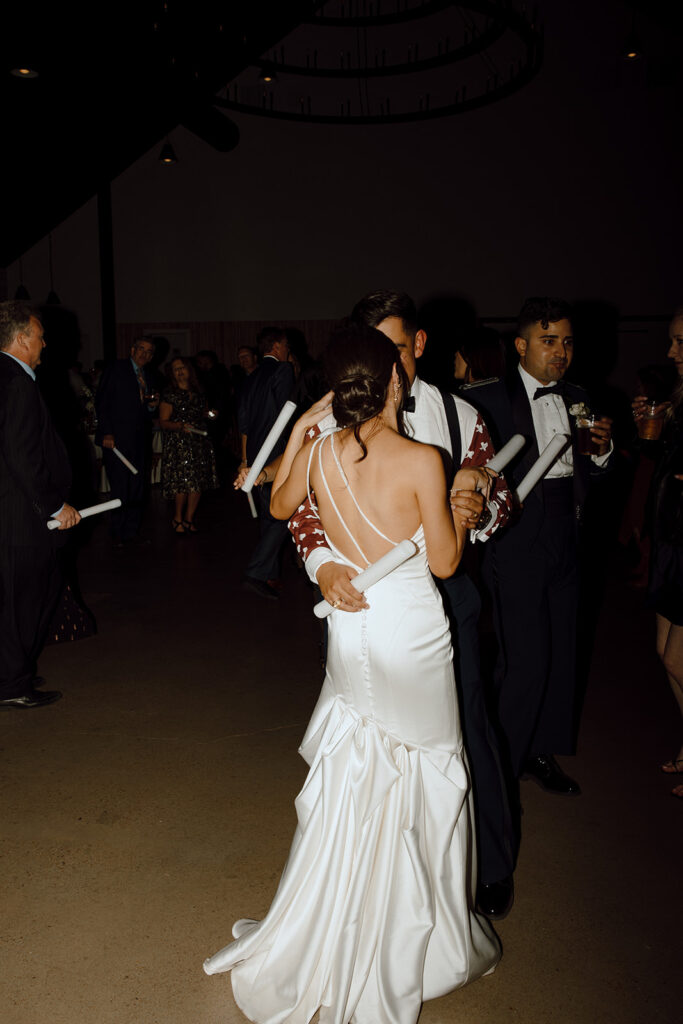 bride and groom dancing together at wedding reception in texas