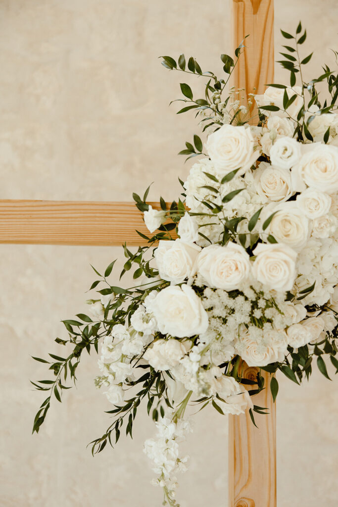 wedding decor details cross with wedding florals