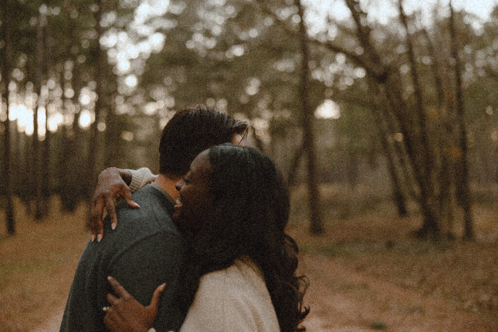 film photography engagement photos in the forest