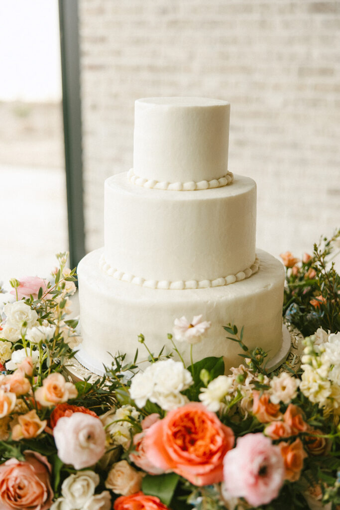 simple wedding cake with spring florals
