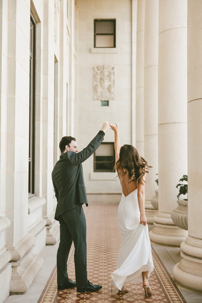 bride and groom day before wedding photos spin pose