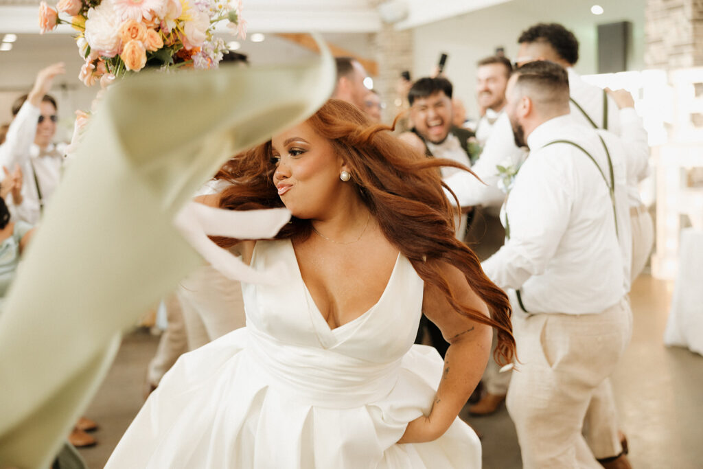 bride dancing during wedding reception