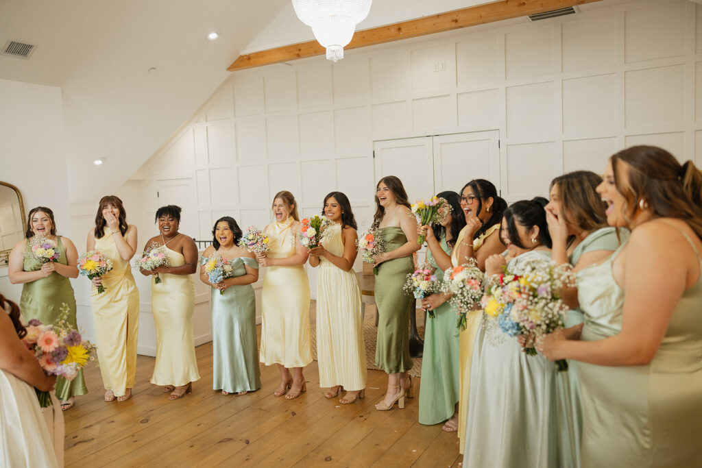 first look with bridesmaids documentary style spring pastels