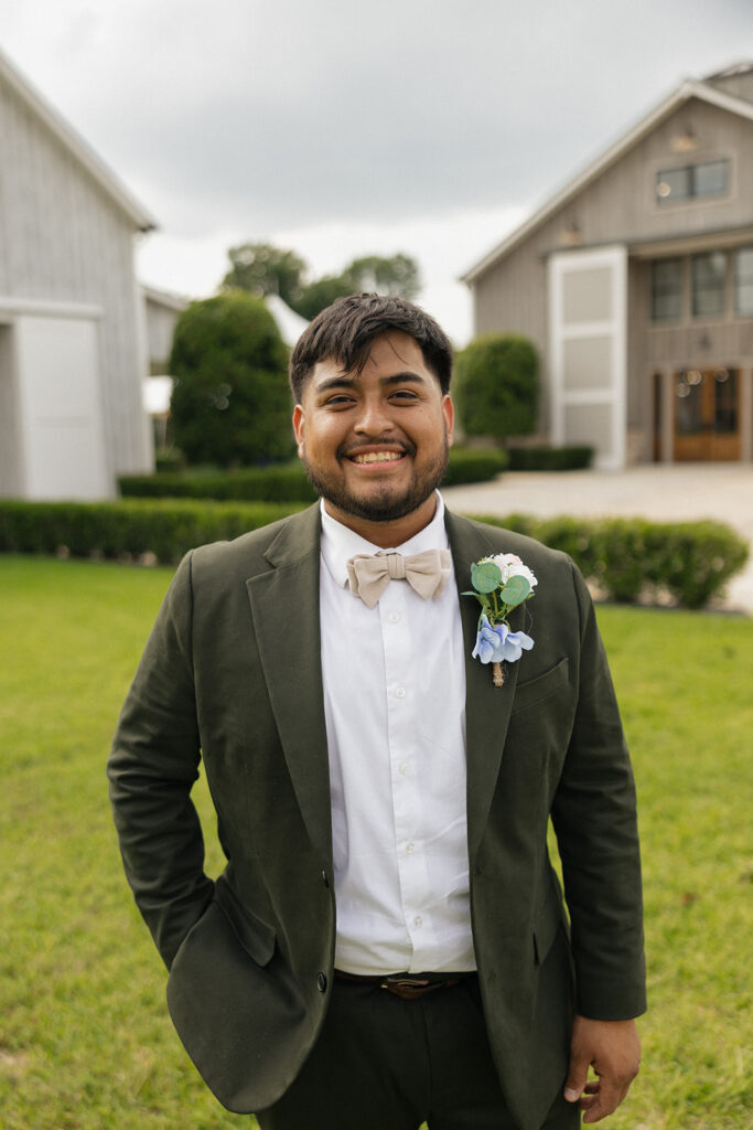 groom outdoor wedding portraits