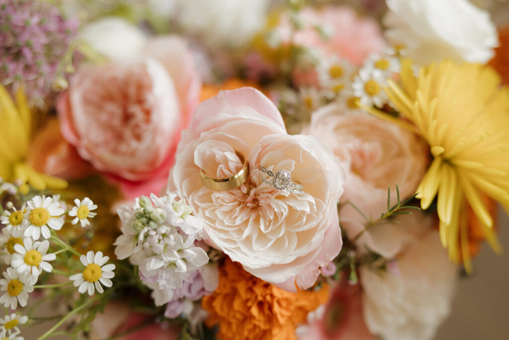 colorful bridal wedding bouquet with wedding ring