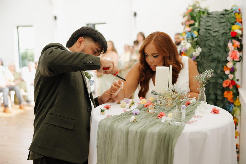 bride and groom cutting the cake in montgomery texas