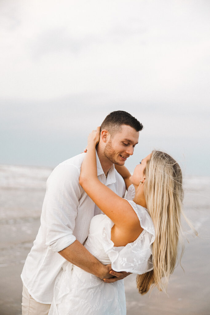 sunset beach engagement photos documentary-style engagement photos