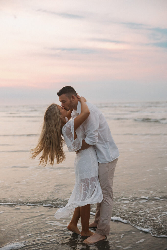 sunset beach engagement photos documentary-style engagement photos