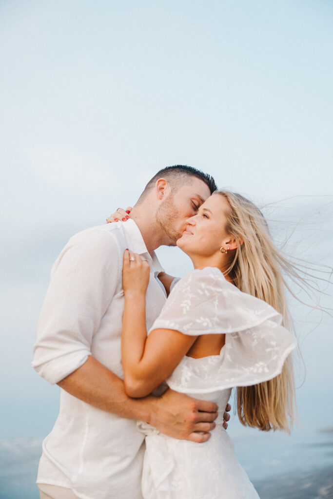 beach engagement photos candid and romantic poses