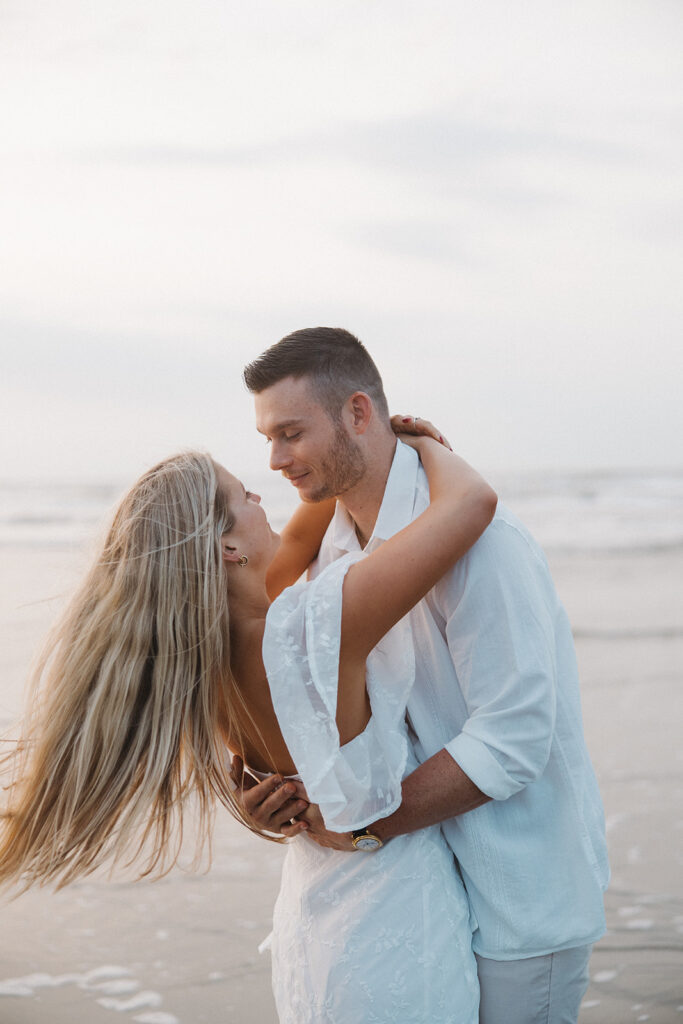 beach engagement photos candid and romantic poses