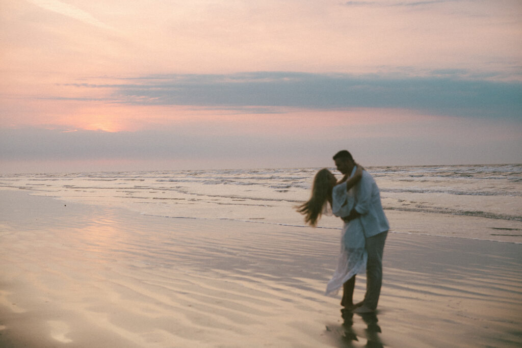 documentary-style engagement photos in texas on the beach romantic and playful