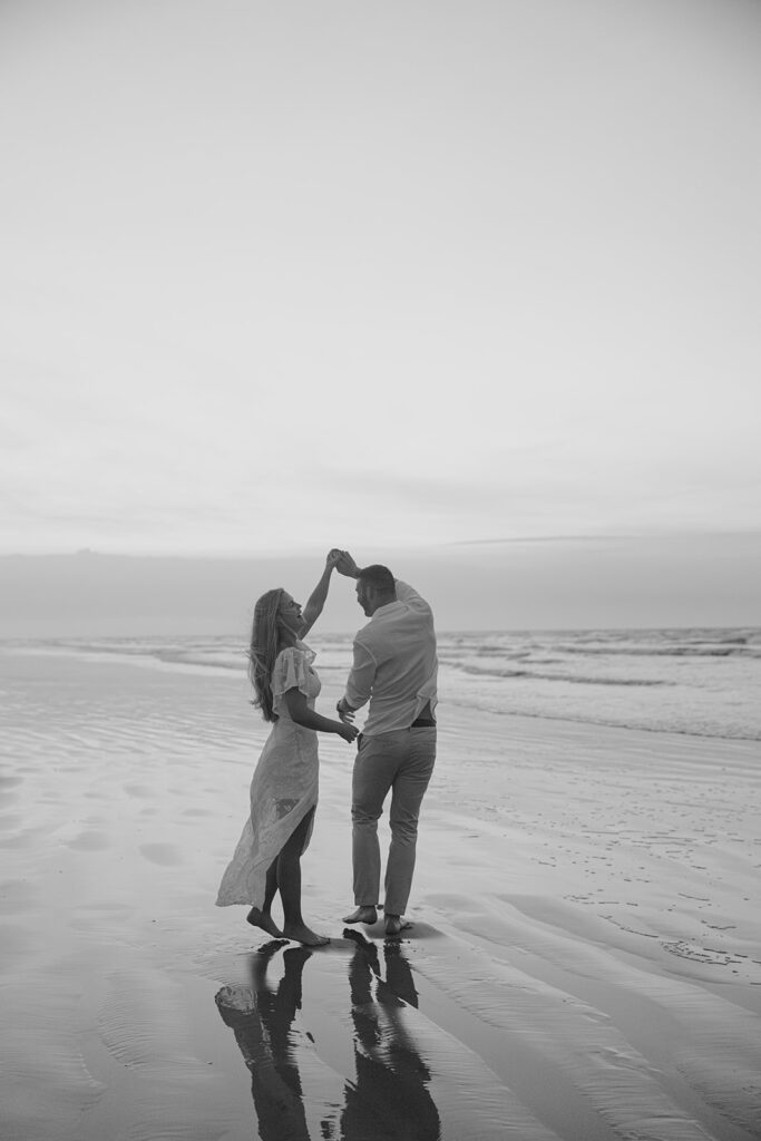 documentary-style engagement photos in texas on the beach