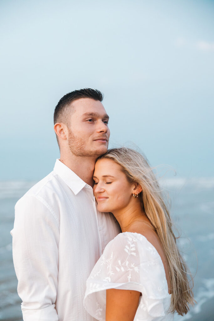 documentary-style engagement photos in texas on the beach