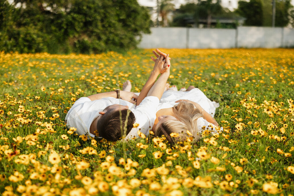 flower field engagement photos in texas documentary-style engagement photos