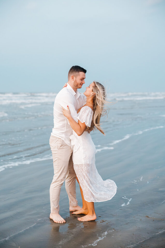 documentary-style engagement photos in texas on the beach