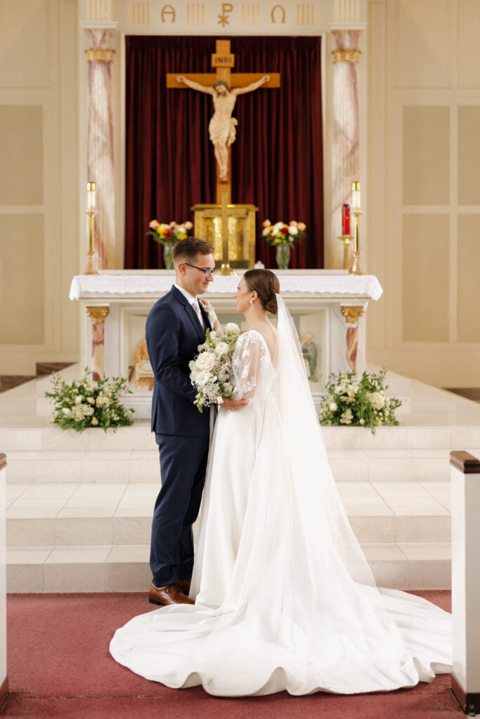 wedding photos bride and groom at altar