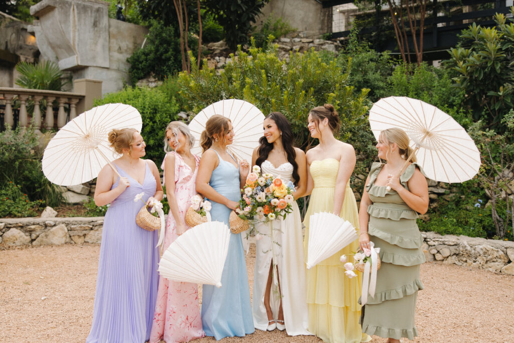 mismatch bridesmaid dresses with umbrellas