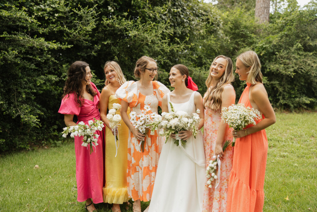 mismatch bridesmaid dresses with umbrellas