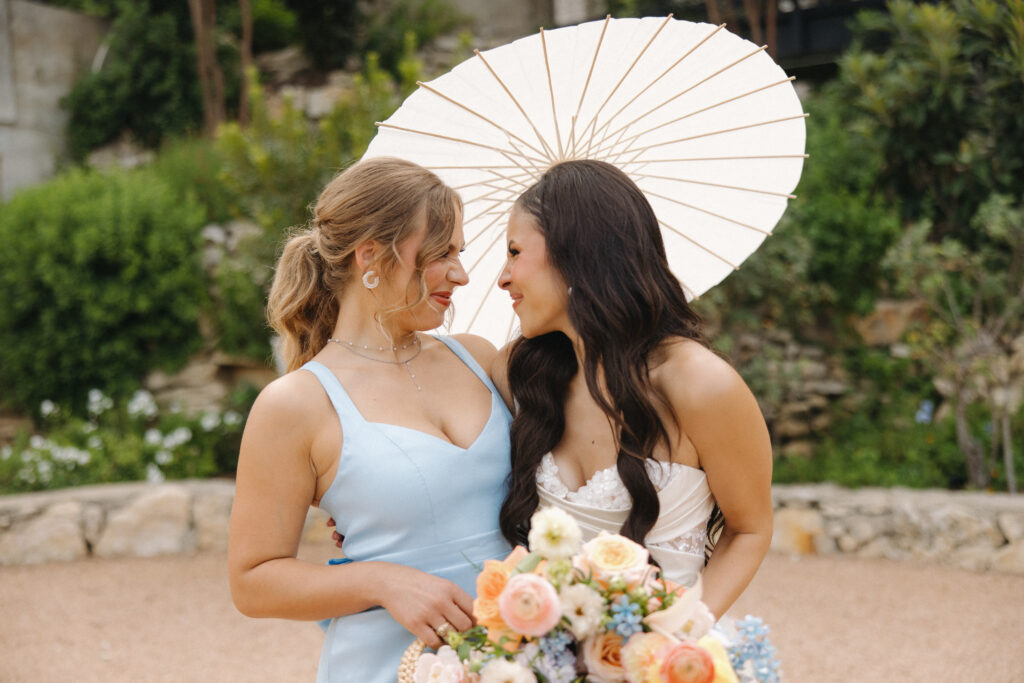 mismatch bridesmaid dresses with umbrellas