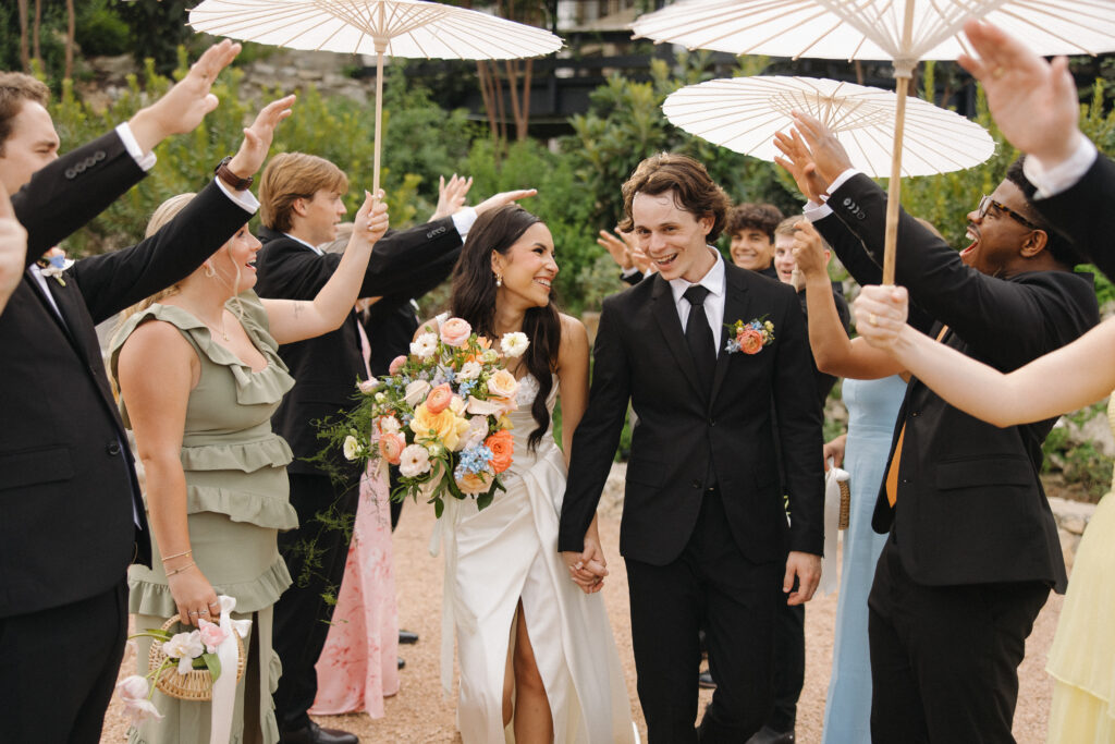 mismatch bridesmaid dresses with umbrellas