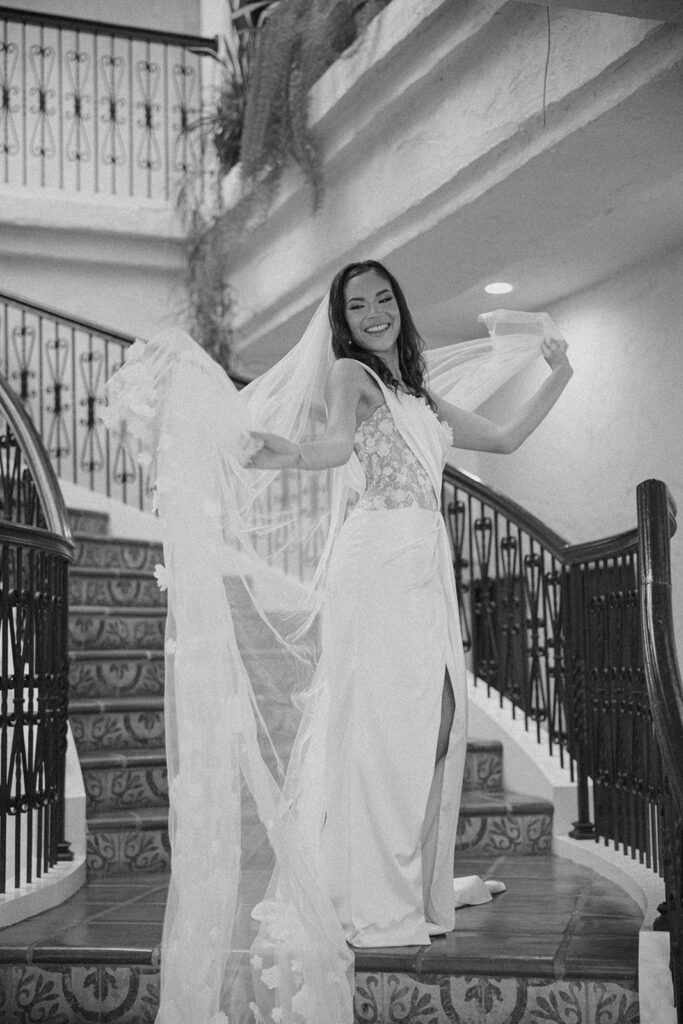 bride posing on modern italy inspired staircase