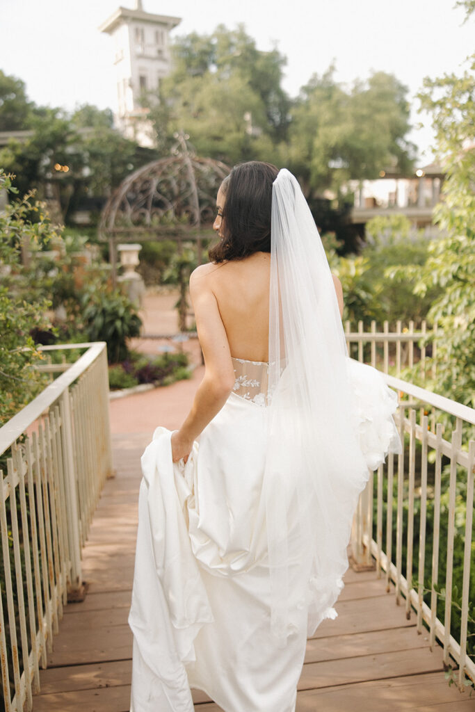 bride in front of modern elegant fountain in texas