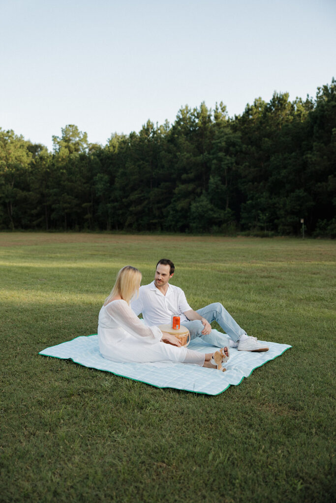 romantic picnic engagement session candid and relaxed