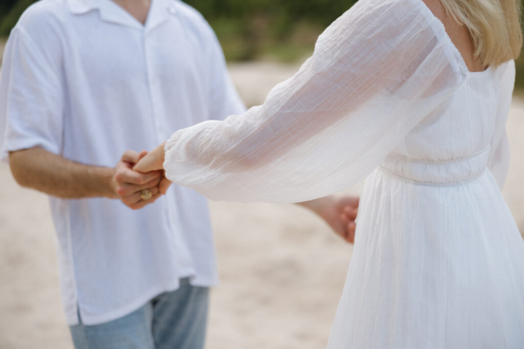 romantic couples photoshoot on the beach