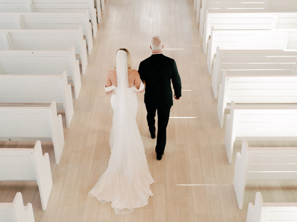 dad walking bride down the aisle