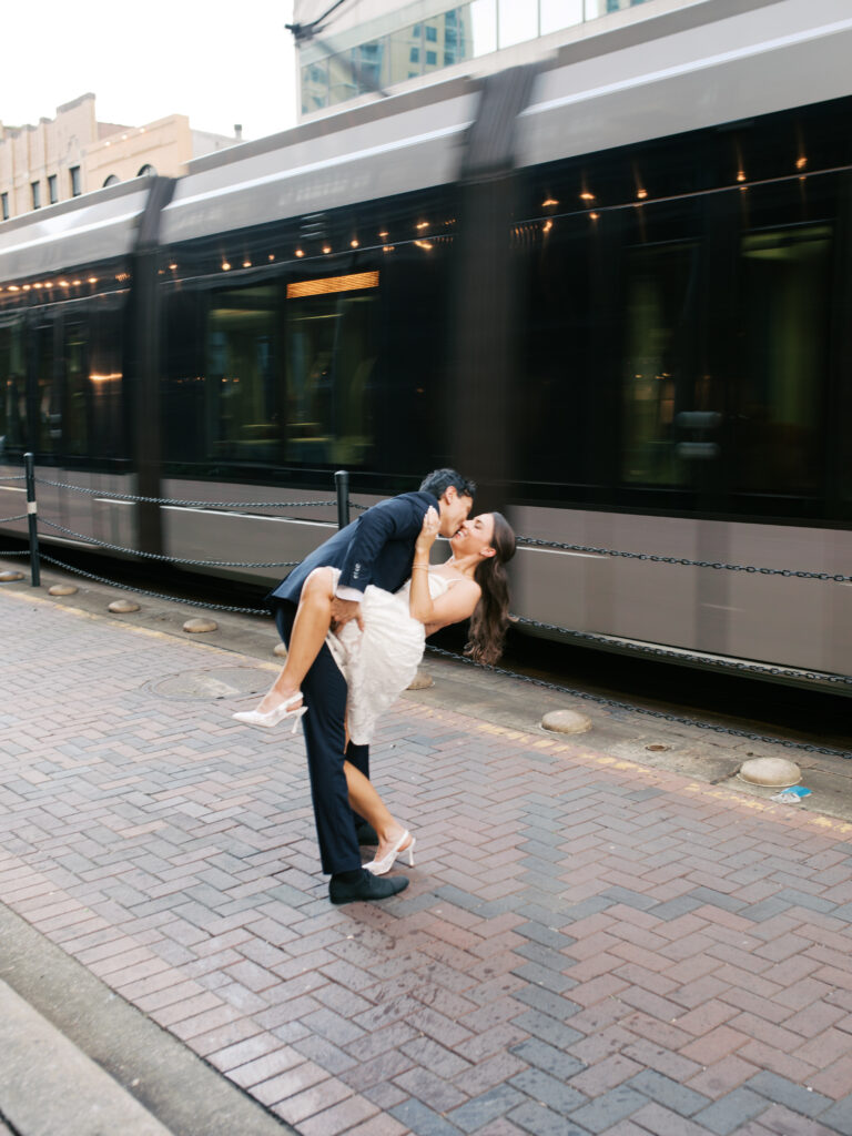 couple photos in front of a subway