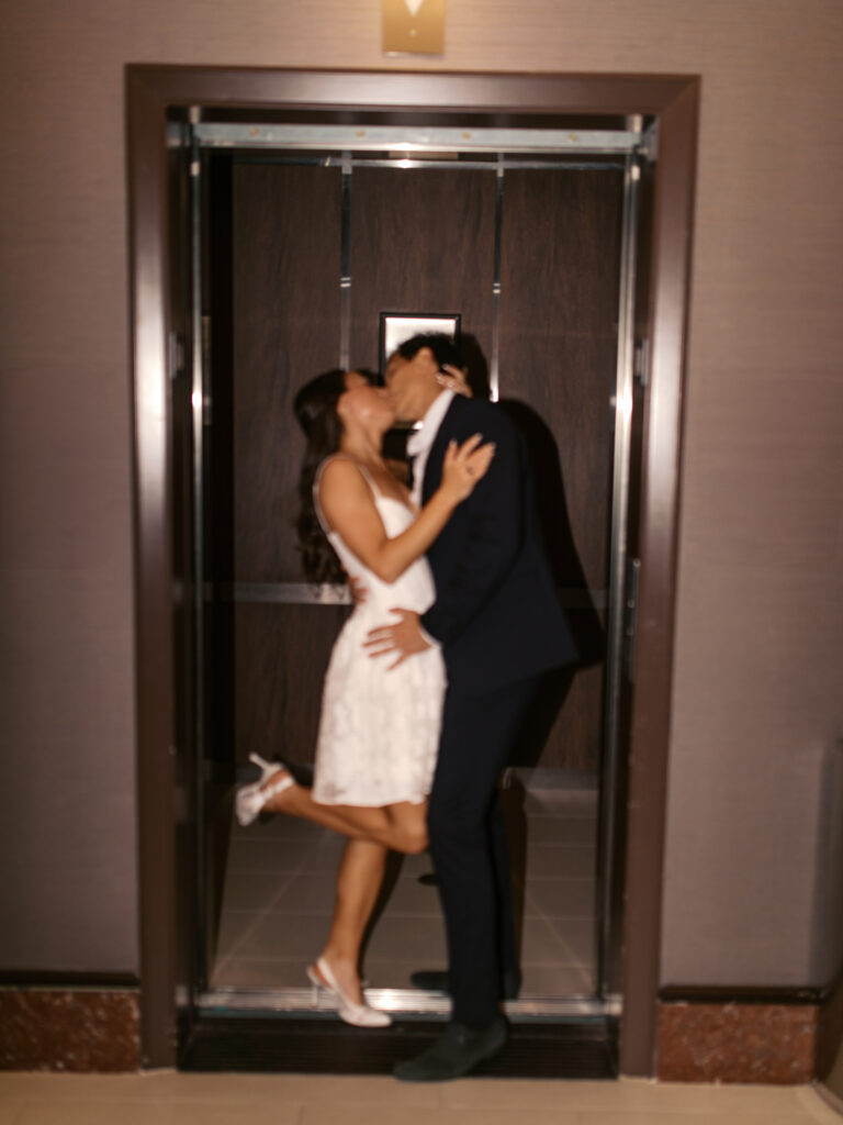 engagement photos in an elevator