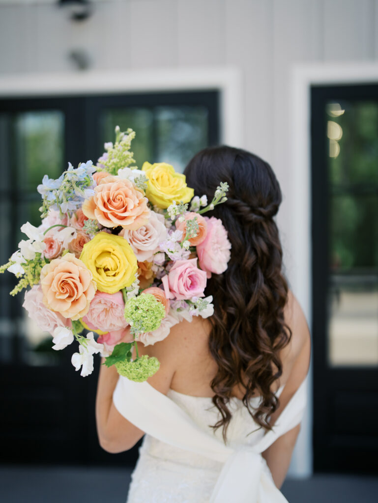 outdoor wedding portraits with colorful florals