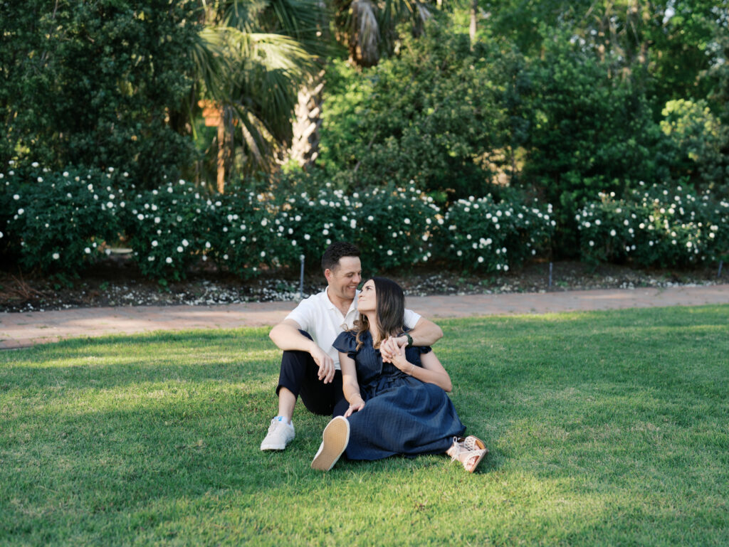 couple smiling at each other for couples photoshoot