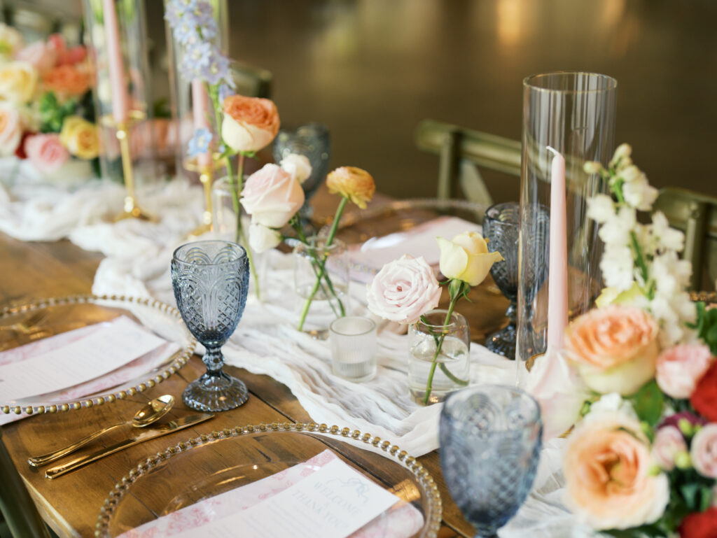 spring wedding tablescapes colorful and vintage at The Meekermark