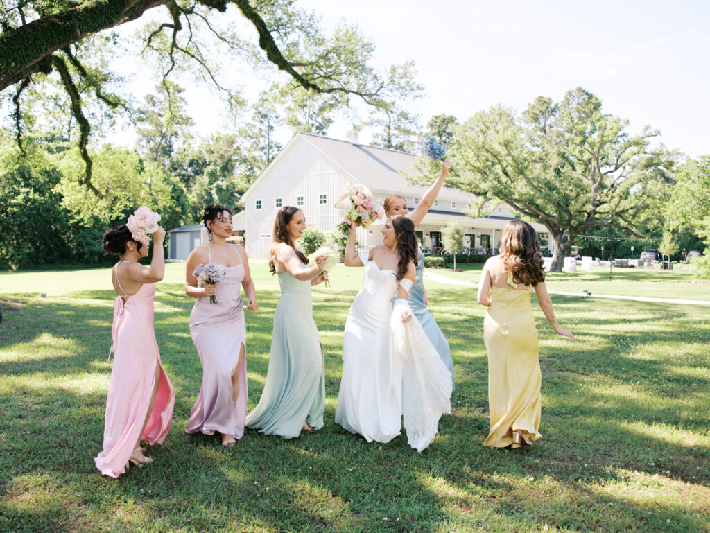 bride walking with bridesmaids