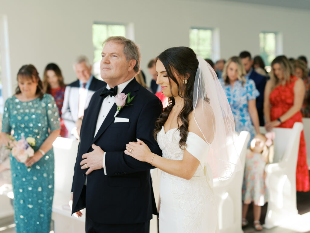 dad walking daughter down the aisle