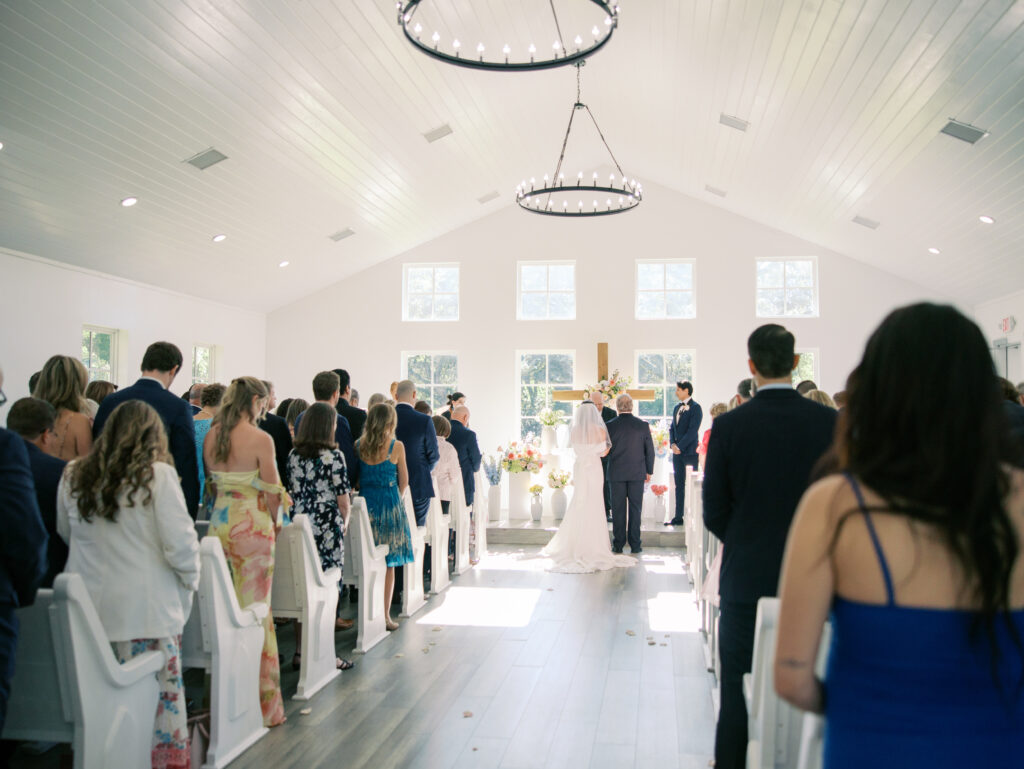 dad walking daughter down the aisle