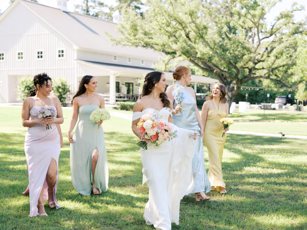 bride walking with bridesmaids