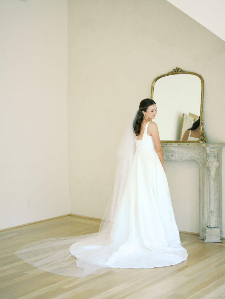 bride smiling at the camera for bridal photoshoot