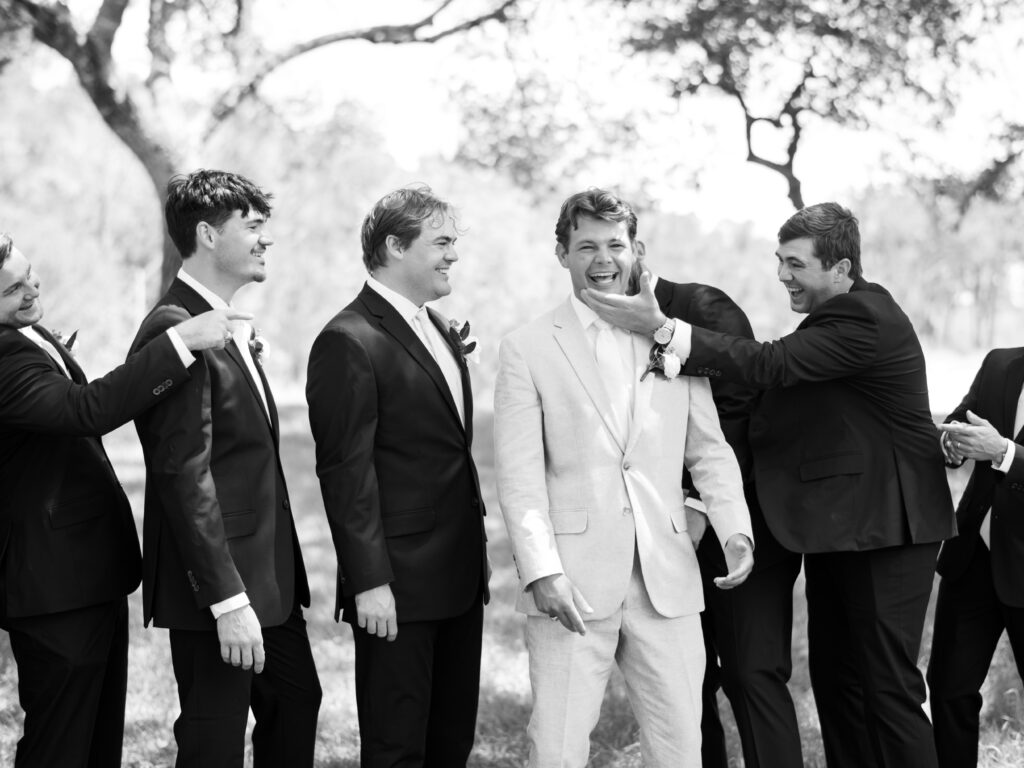 candid groomsmen photos outdoors