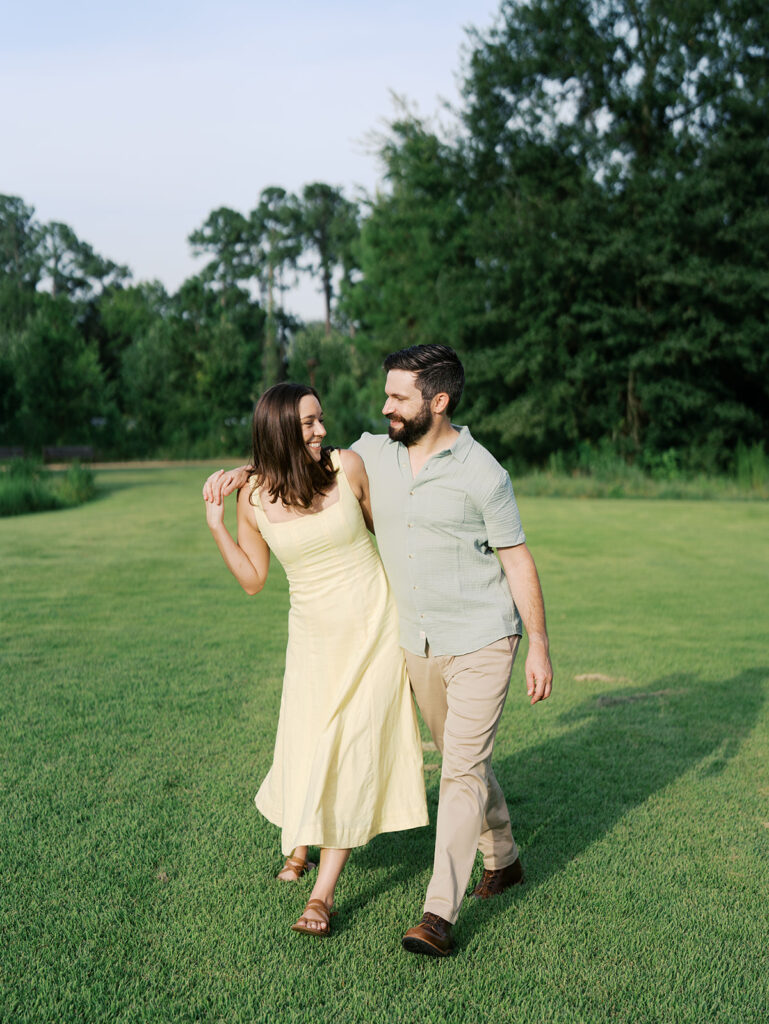 couple walking toward the camera candid photography