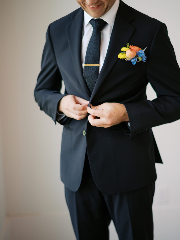 groom getting ready wedding portraits