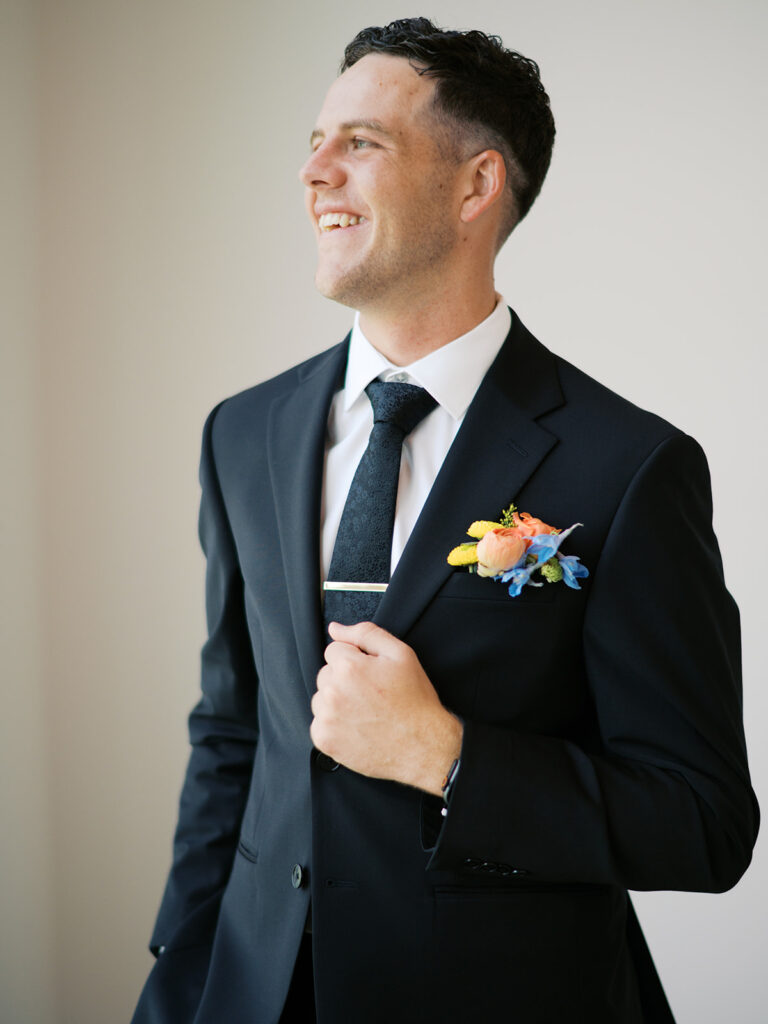 groom getting ready wedding portraits
