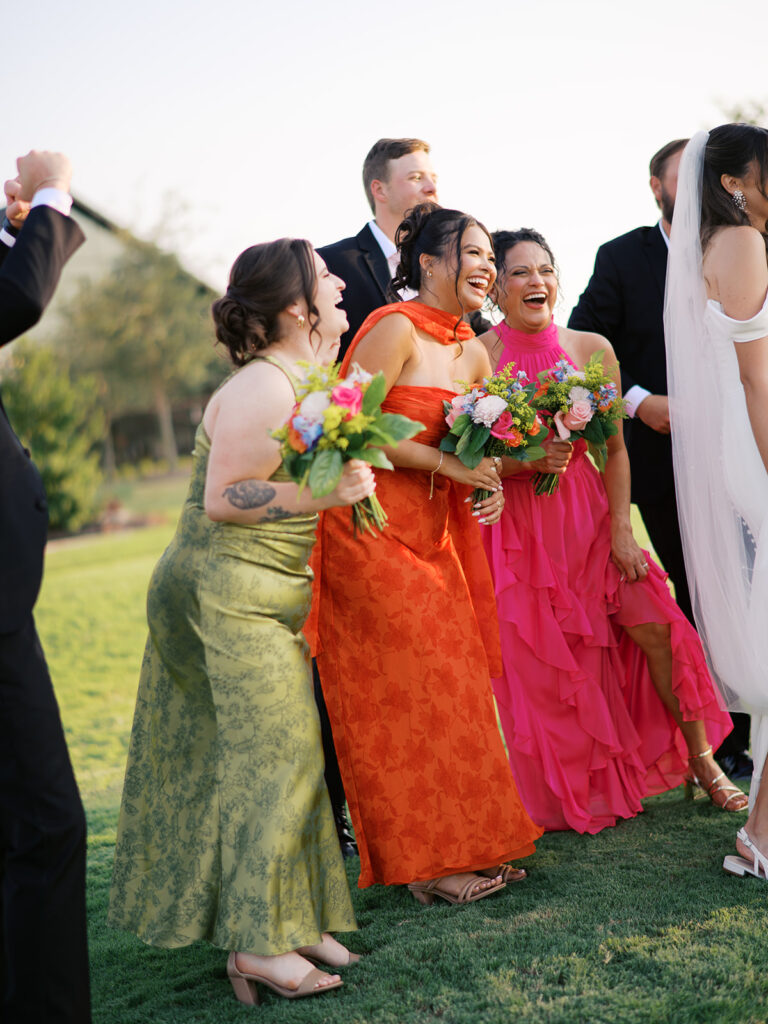 colorful bridal party photos at camp hosea wedding venues in texas